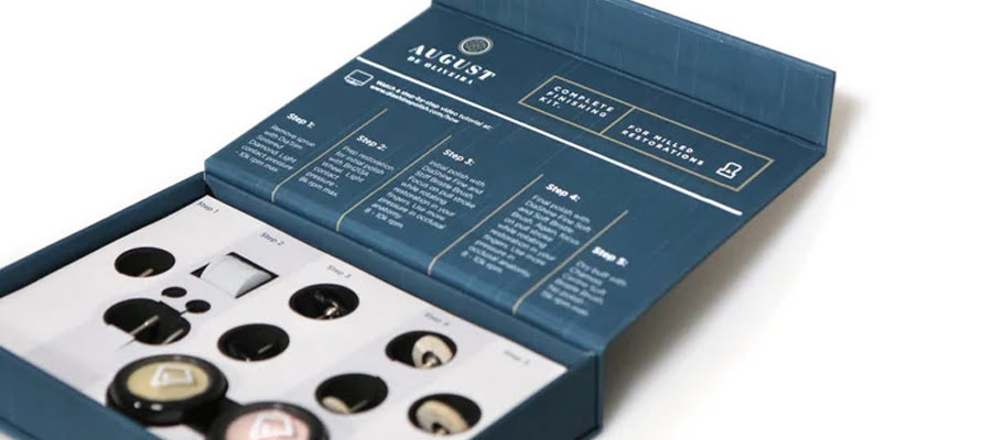 Close‑up of DiaShine Polishing Kit showing diamond polishing pastes, SHP bristle brushes and sintered diamond adjusting tools for CAD/CAM restorations